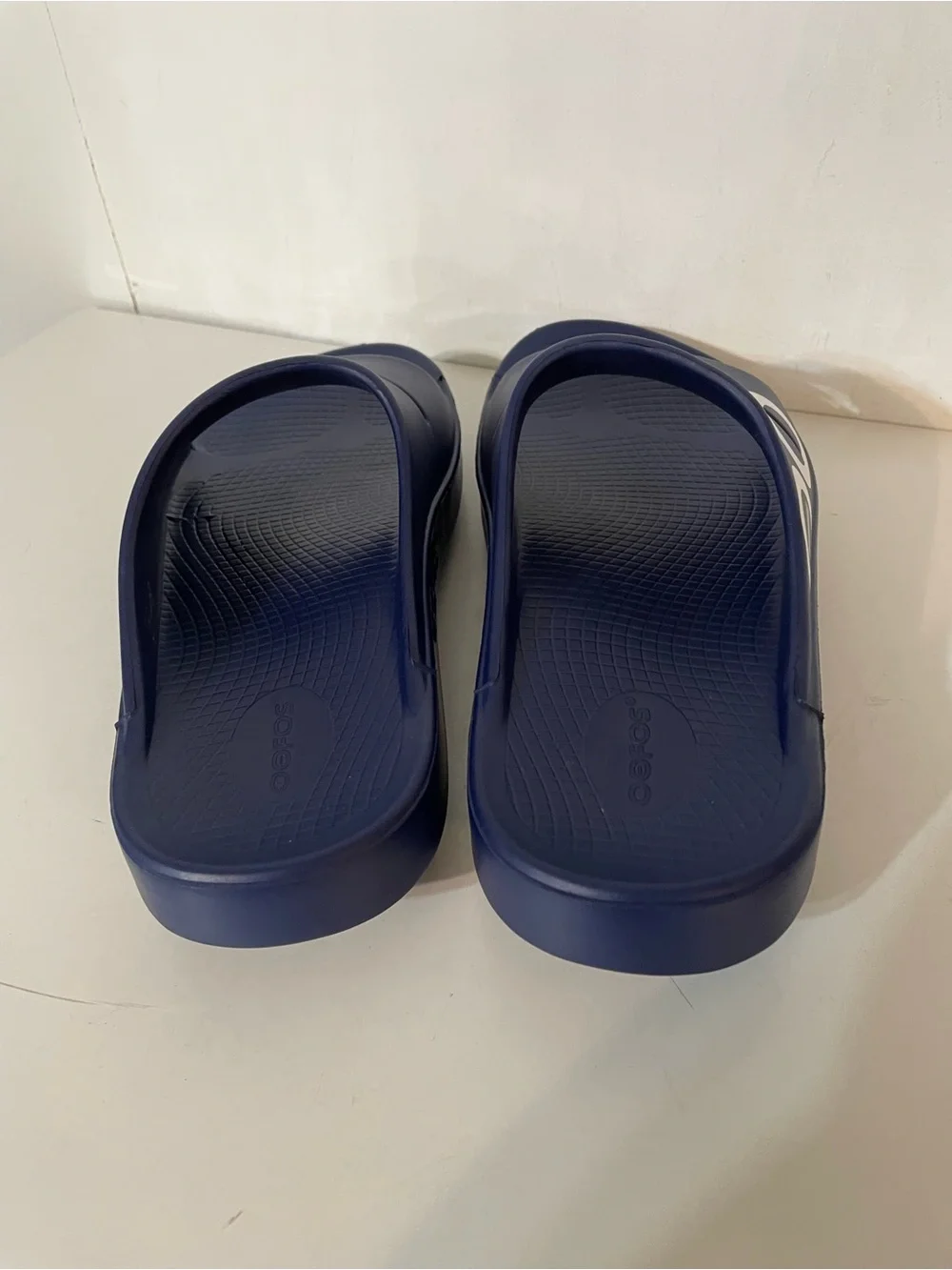 Oofos Slides in Navy Blue